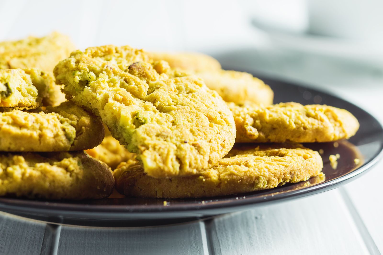 Freshly baked pistachio cookies on a plate